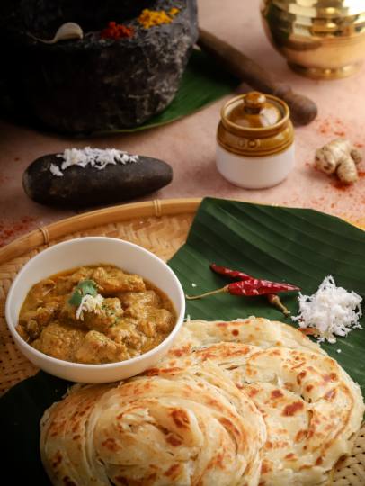 Malabar Parotta with Coconut Chicken Curry